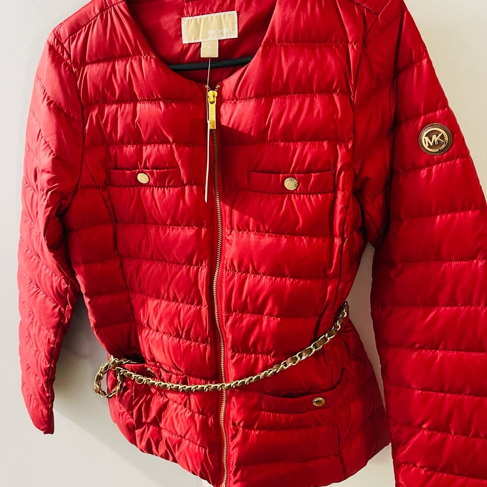 1 ladies medium MK cherry red light puffy coat with removable gold tone belt.